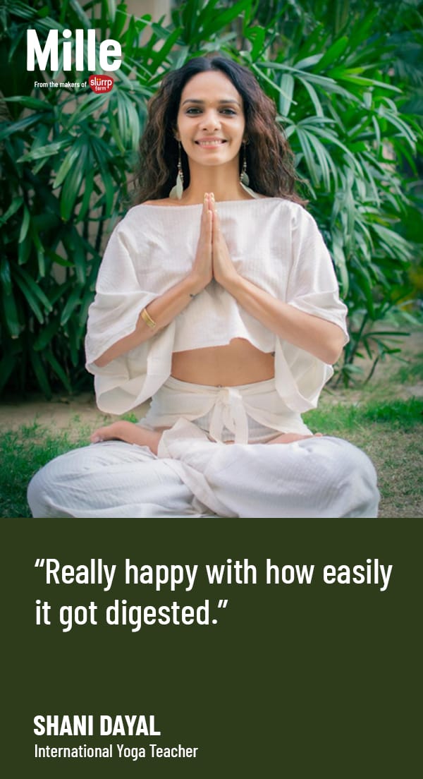 Woman in a white outfit sitting in a yoga pose with greenery in the background, featuring text from Mille magazine.