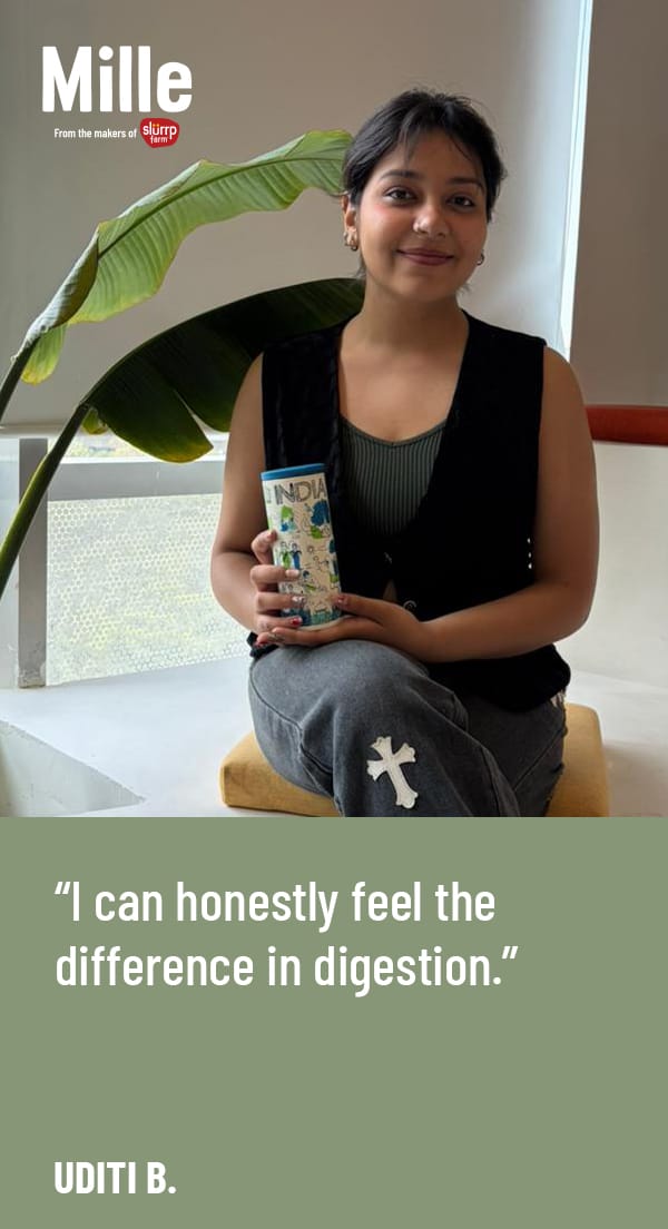 Woman holding a package with text about feeling the difference in digestion.