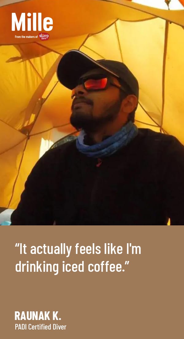 Person wearing sunglasses and a cap under a yellow umbrella with text overlay.