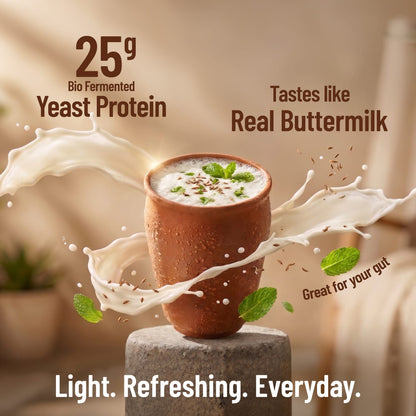 Ceramic cup with a beverage, surrounded by splashes of milk and text highlighting yeast protein and buttermilk taste.